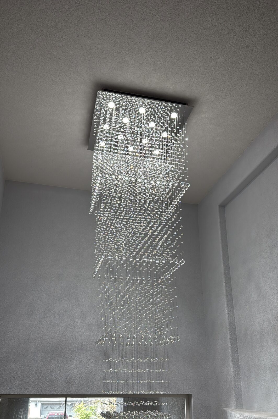 Crystal rain-drop chandelier side view showing full drop length — Cyber Electric LLC