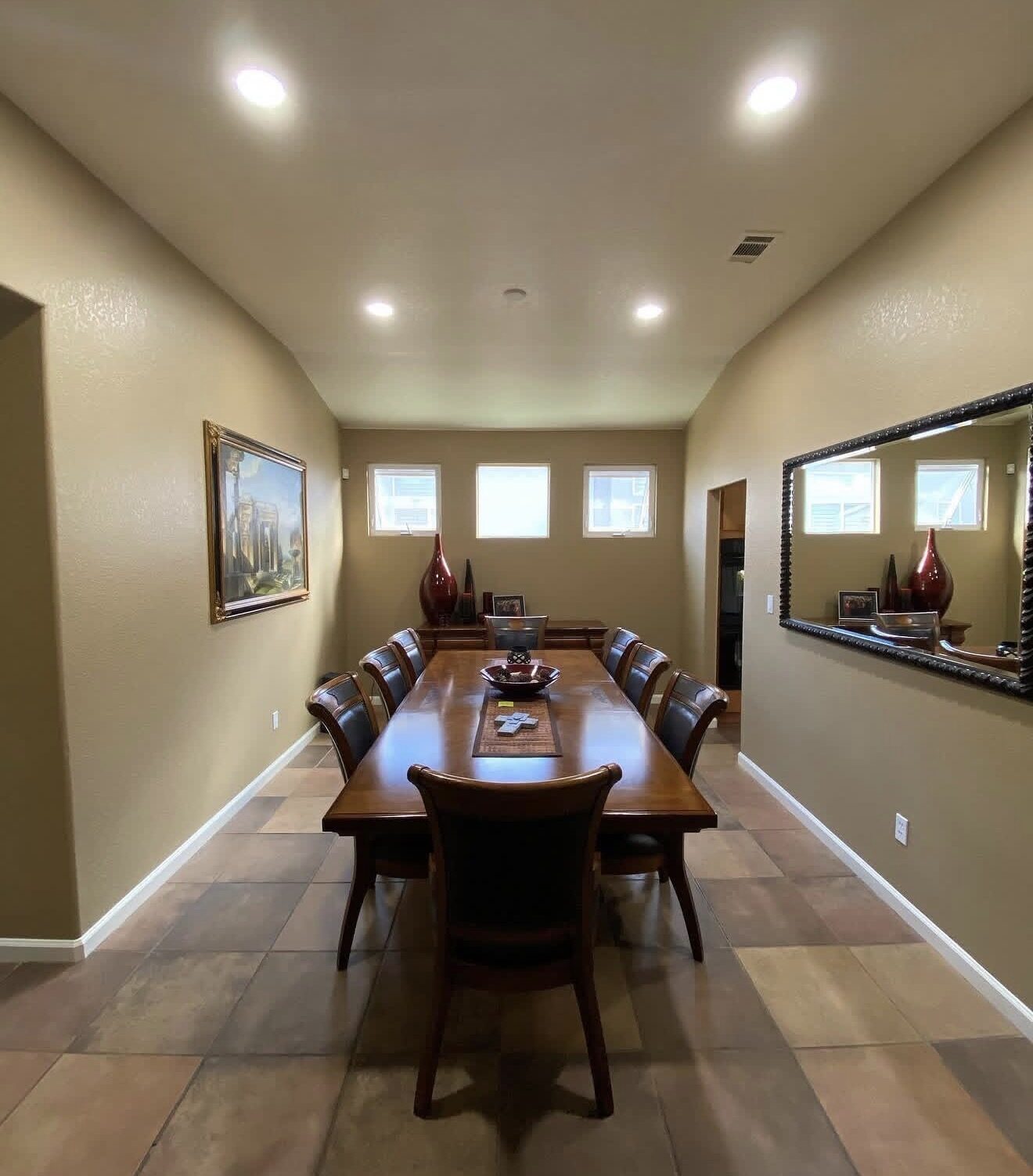 Formal dining room with recessed LED lights in sloped ceiling — Cyber Electric LLC, Modesto CA