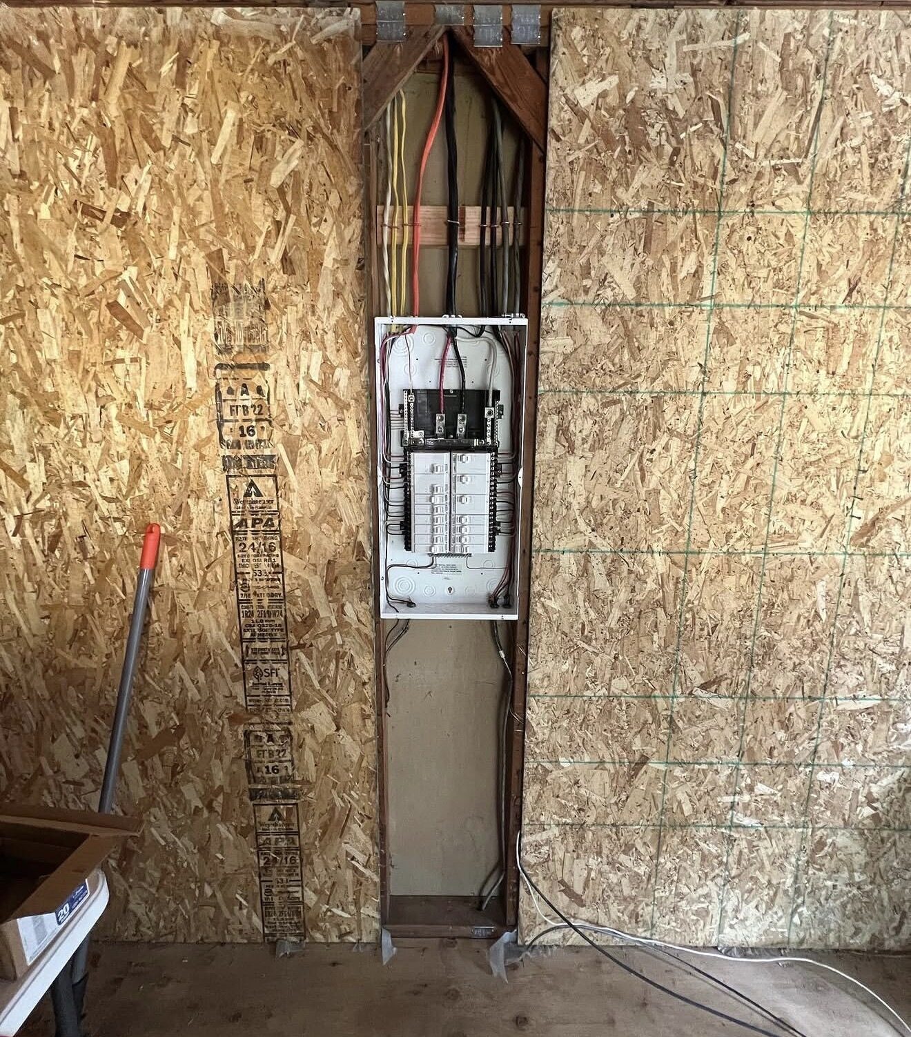 Leviton subpanel rough-in mounted in OSB wall framing during addition construction — Cyber Electric LLC